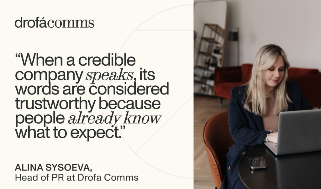 Alina Sysoeva, Head of PR at Drofa Comms, working on a laptop beside a quote about corporate credibility and fintech PR strategy.